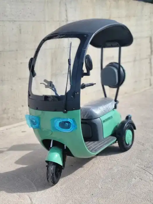 електрическа триколка с Покрив
